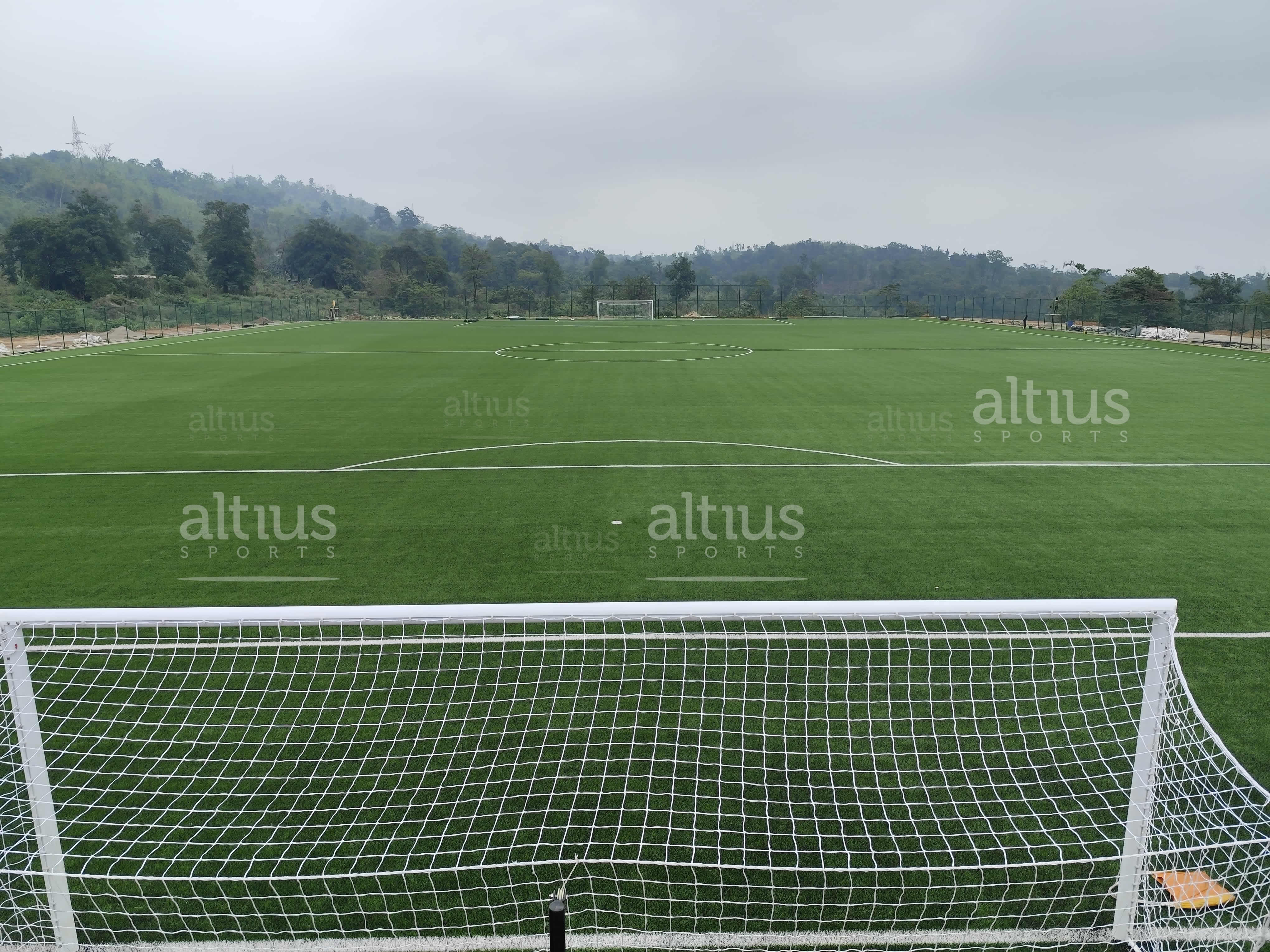 Footballers playing on a stadium